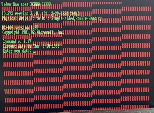 The sign-on message from DOS 1.25. It says: Video-Ram area 3C000-3FFFF, IO.SYS Version 2.10 (C) 2-29-1984 SANYO, Physical drive A: to D: = Single-sided, double density, MS-DOS version 1.25, Copyright 1981,82 Microsoft, Inc., Command v. 1.17, Current date is Thursday 3-10-1983, Enter new date: