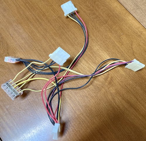 The above diagram, but in reality form. Notice how it doesn't come even close to lying flat, because of the different lengths of the floppy harnesses. Sanyo didn't want to waste any money on wire length, I guess.