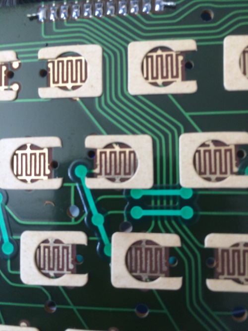 The PCB pads have these weird cushions around them.