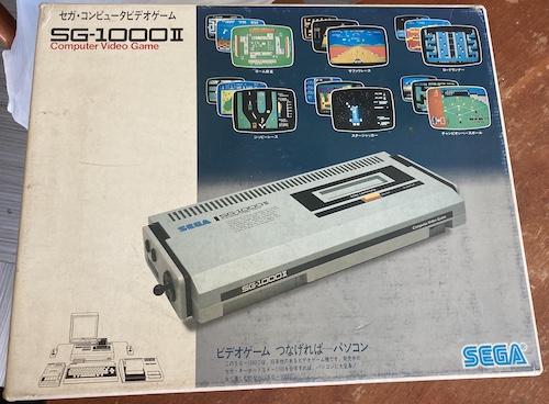 The SG-1000 II's pretty-good-looking box. I swear I'll resurface this kitchen table one day.