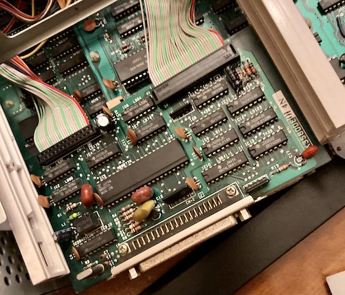 The floppy board connectors are soldered into the floppy board.