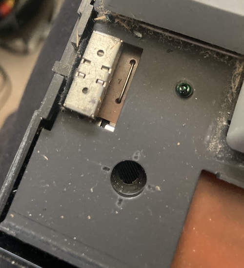 A toggle switch hangs off the end of the keyboard PCB.