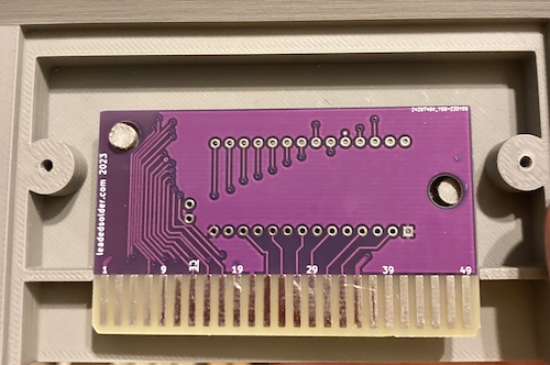 The PCB doesn't fit properly into a grey 3D-printed case. The pegs don't line up.