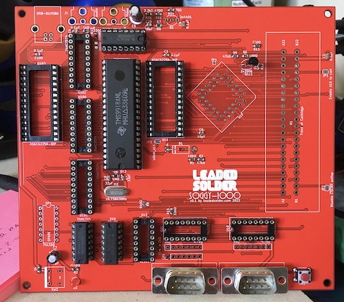 The first revision board, assembled from spare parts I had lying around. The TMS9918 and SN76489 are populated, as are the controller ports, and a lot of sockets.