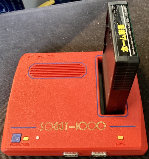 The Soggy-1000 as it sits today, in a handsome 3D-printed red case.