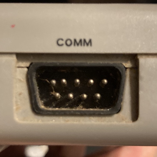 One of the pins in the COMM connector is bent.