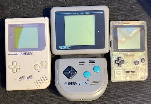 From left to right: an original Game Boy, the Supervision, and a clear Game Boy Pocket