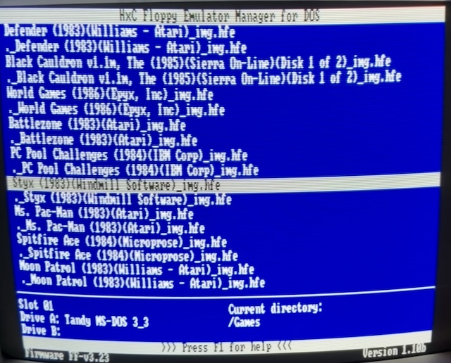 HXCfs running on the Tandy 1000SX. It shows a list of disk images that can be bound to each drive. It is also showing a lot of supposedly invisible files made by macOS.