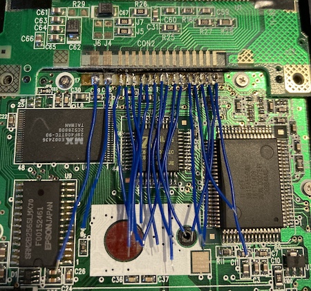 17 blue wires are sticking out of the motherboard.