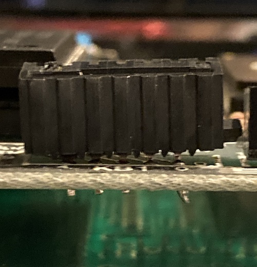The KB2 connector is very crooked off the board. It looks melted in one corner.