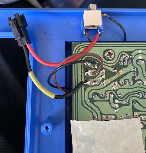 The JST SM connector is on the battery wires now. Since the pre-crimped wires were red and black, and the originals were red and white, I've added a piece of yellow heat shrink to the battery negative wire to avoid any confusion with the black wire already running on the board next to it.