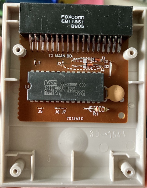 The component side of the cartridge. A connector says FOXCONN EB11861 8805 (maybe E811861?) and a large mask ROM IC says VTECH TC531000AP-L301