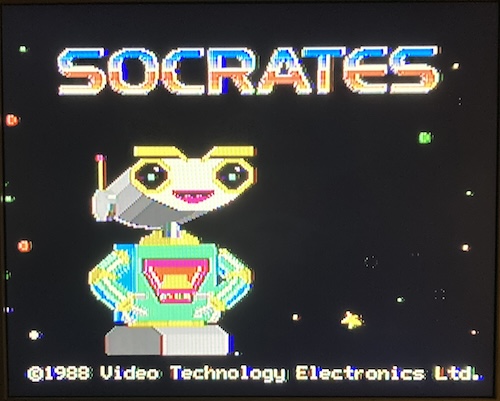 The Socrates title screen is fired up, with a robot staring into the wonders of space. Copyright 1988 Video Technology Electronics Ltd.