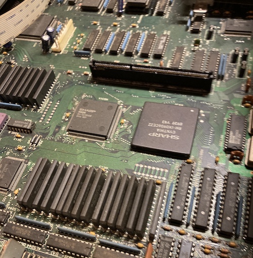 The Vicon (left) and Cynthia (right) chips are flanked by two armies of SIP video RAM.