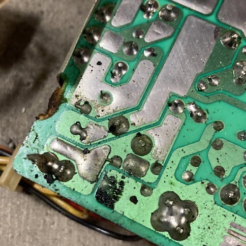 The damage to the PSU PCB.